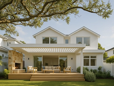Modern white two-storey home extension with timber deck and pergola in Sydney