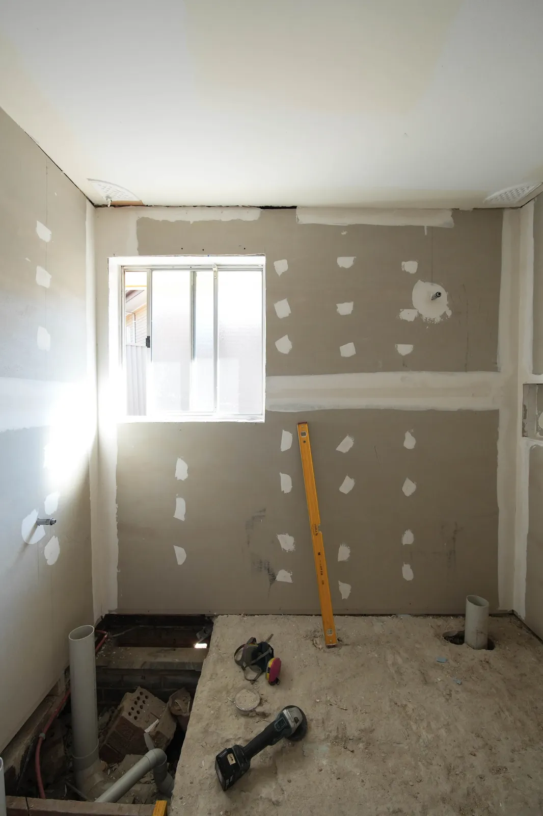 Original Toongabbie bathroom stripped back to framing and plasterboard