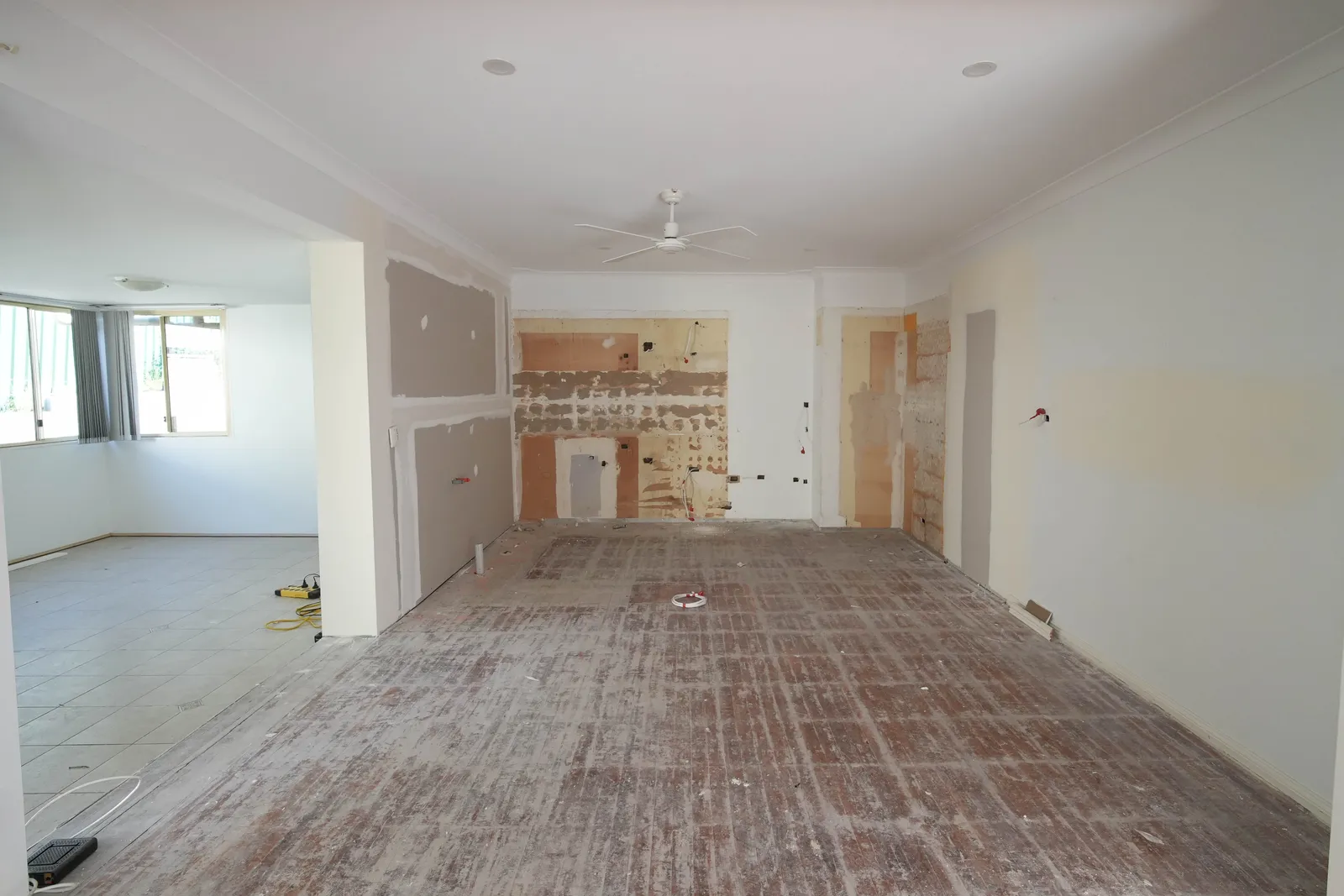 Toongabbie kitchen and living area stripped back before renovation