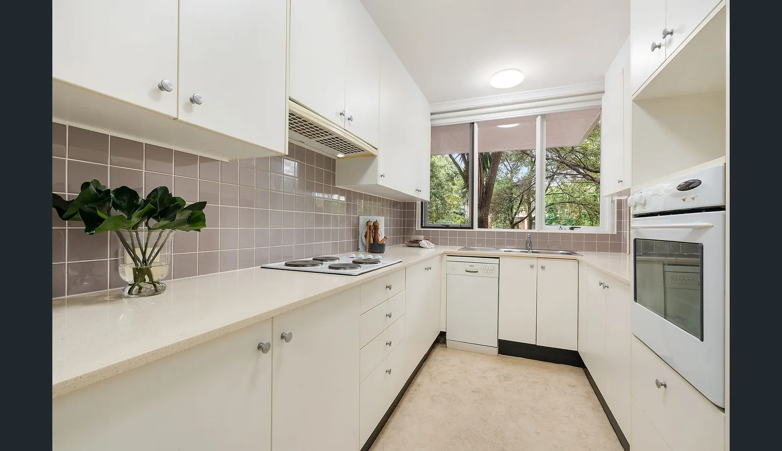 The original galley kitchen at the Wollstonecraft apartment before renovation