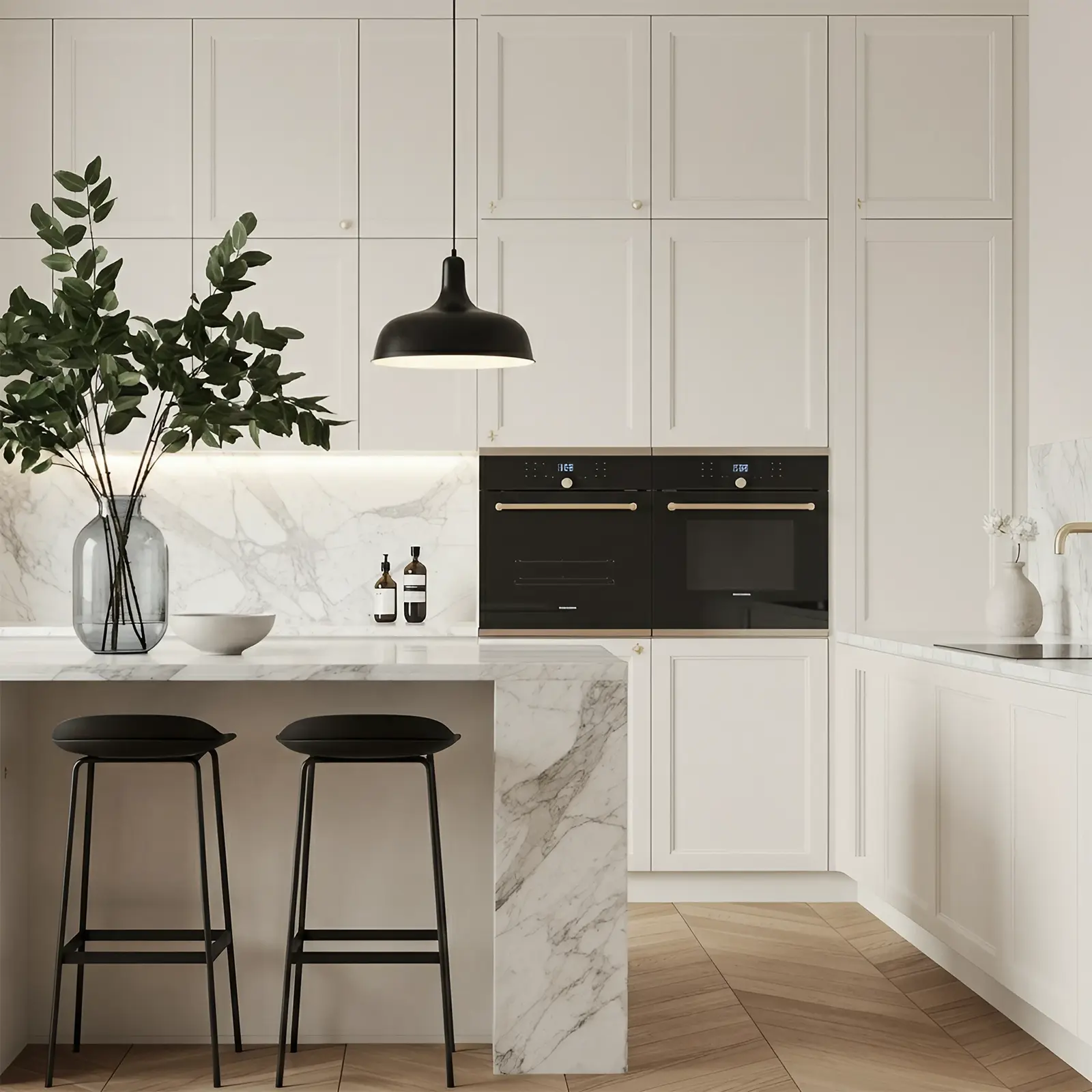 Luxury white kitchen with marble island and black accent fixtures